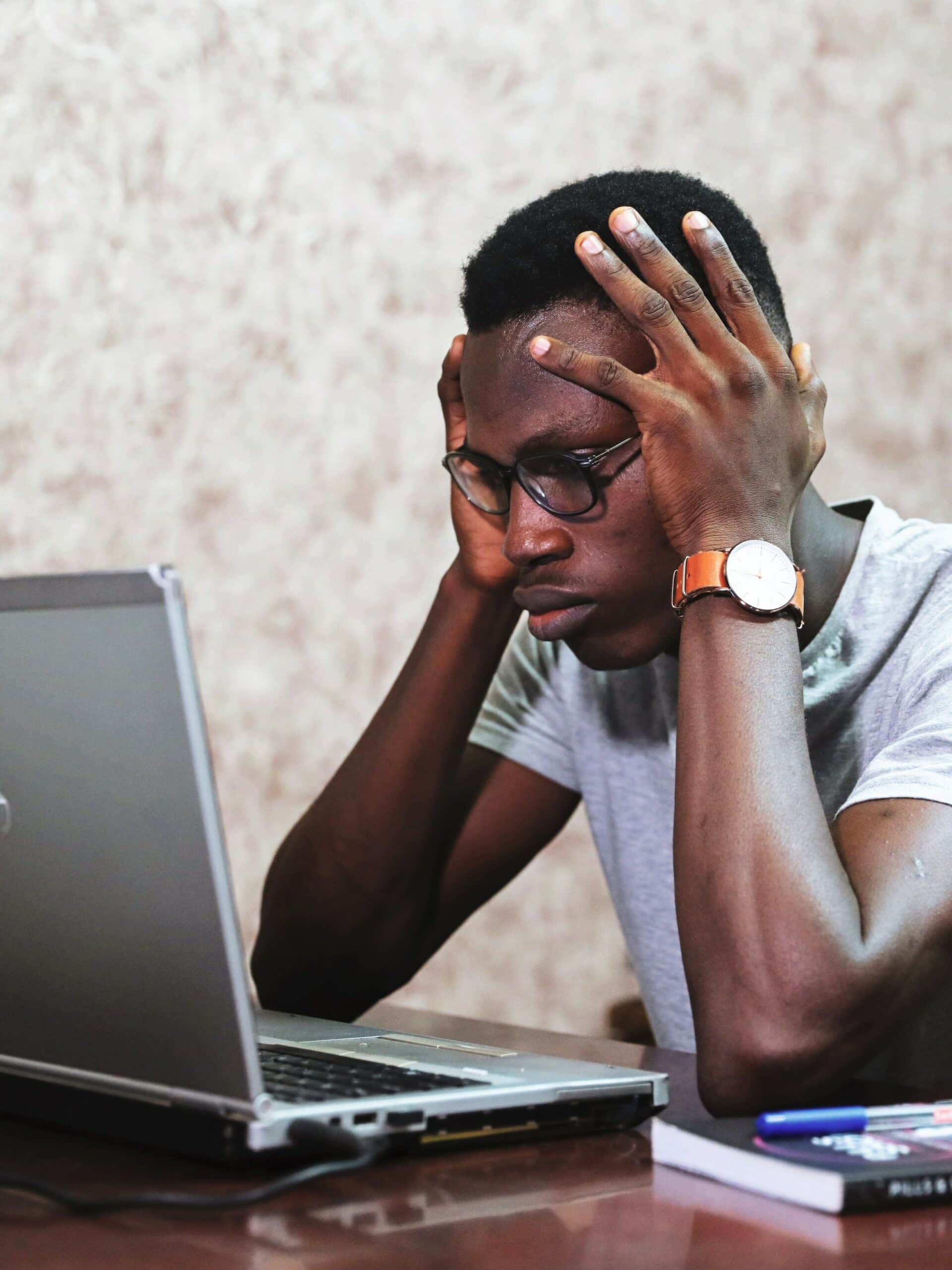 Man stressed out because he is a web developer